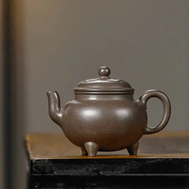 Brown ceramic teapot on Dragon Tripod with Yixing Zisha craftsmanship, ideal Yixing teapot