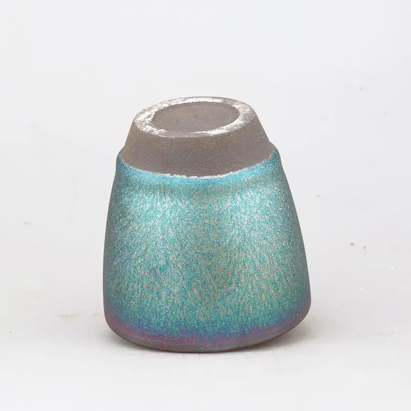 Iridescent turquoise ceramic vase from Jian Zhan Tenmoku ceramics in the Dream collection