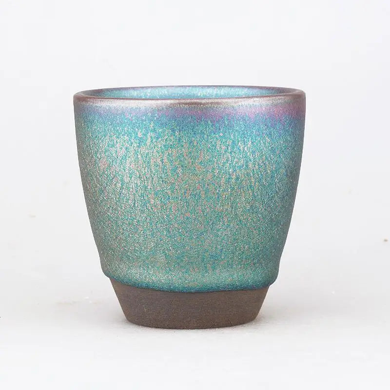 Iridescent turquoise ceramic pot from Jian Zhan Tenmoku Ceramics by Jianyang Jian Zhan