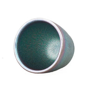 Green ceramic bowl from Dream, showcasing Jian Yang Jian Zhan tenmoku ceramics style