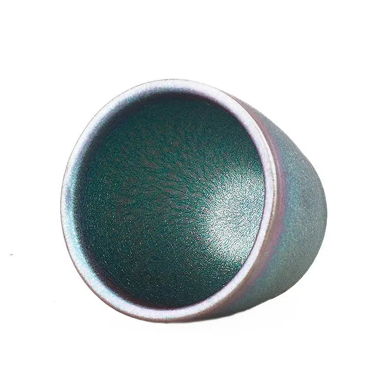 Green ceramic bowl from Dream, showcasing Jian Yang Jian Zhan tenmoku ceramics style