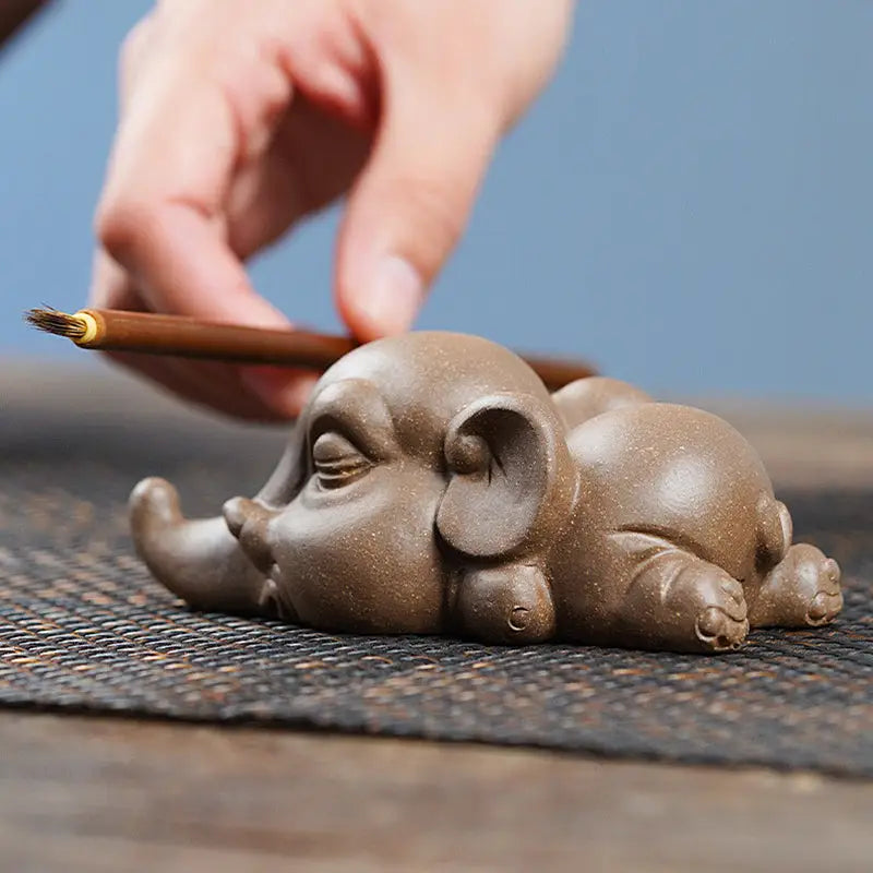 Resting Clay Elephant from Dreaming Elephant Tea, perfect for Feng Shui tea pets