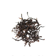Pile of dried black tea leaves for Duck Shit Aroma Dancong Oolong Tea, Phoenix Dancong style