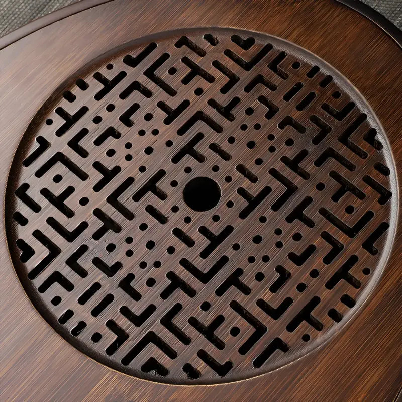 Circular patterned wooden tray from Echo of Stillness oval bamboo gongfu tray