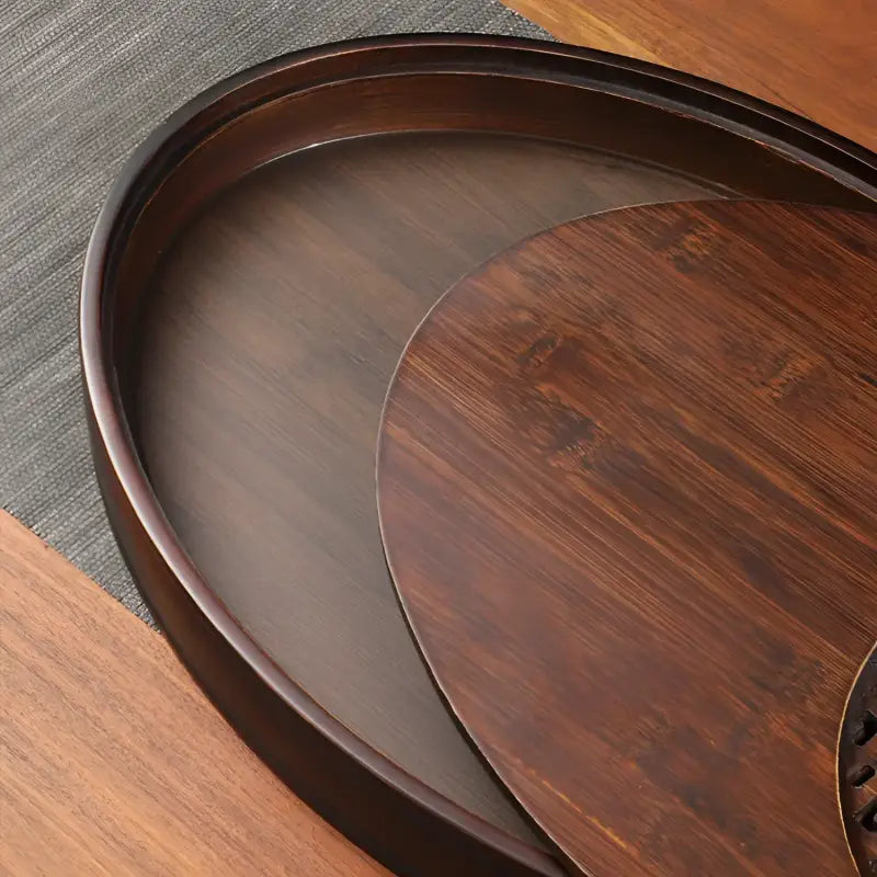 Dark wooden oval tray from Echo of Stillness oval bamboo gongfu collection