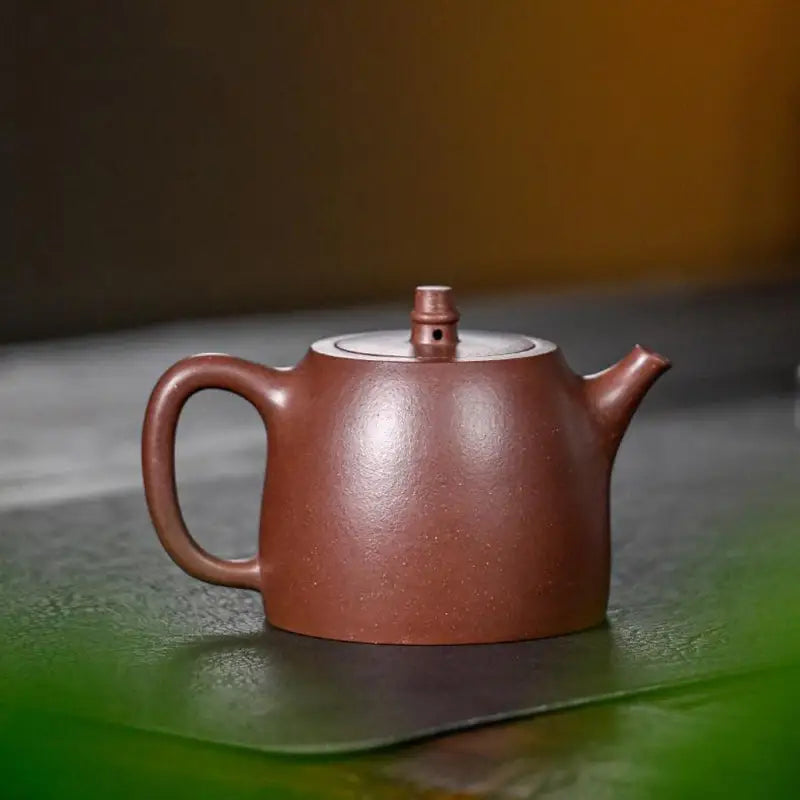Brown ceramic yixing zisha teapot for gongfu brewing from Echo Peak