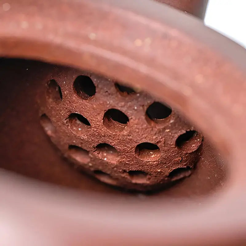Porous reddish-brown Ceramic Filter for Gongfu Brewing in Echo Peak Yixing Zisha Teapot
