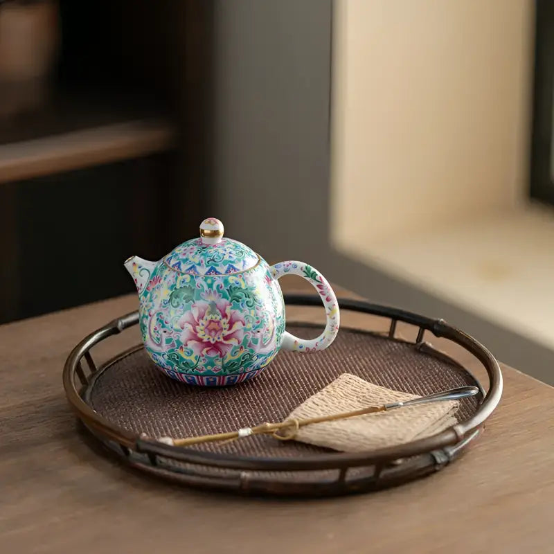 Floral patterned imperial enamel porcelain teapot showcasing Jingdezhen enamel art, royal Chinese design