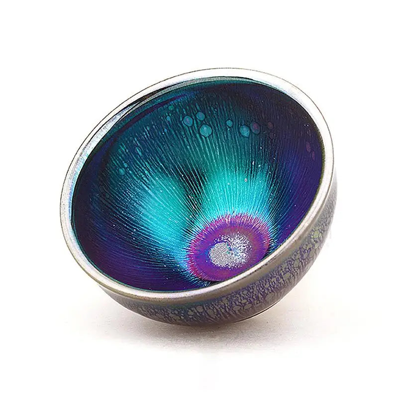 Iridescent ceramic bowl with oil spot glaze by Jian Zhan for gongfu tea brewing