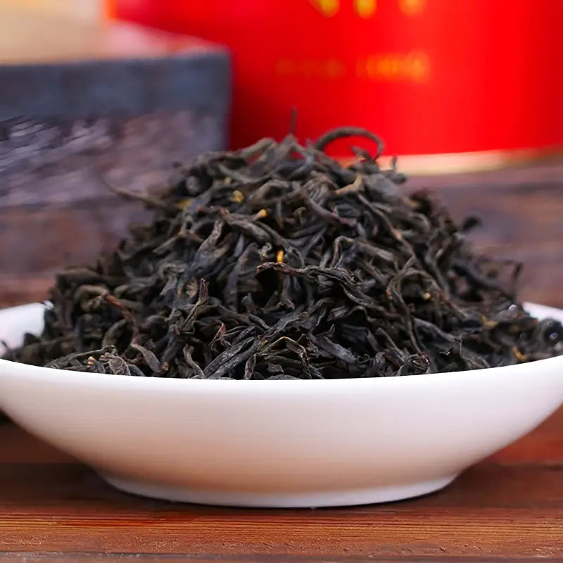 Loose black tea leaves for Floral Sou Chong Red Tea, perfect for teapots, tea sets, and mugs