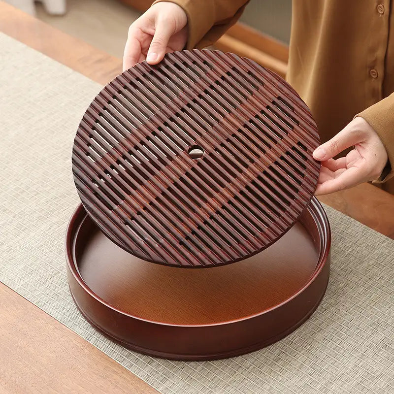 Flow Circle round bamboo tea tray with slotted insert for elegant bamboo tea serving