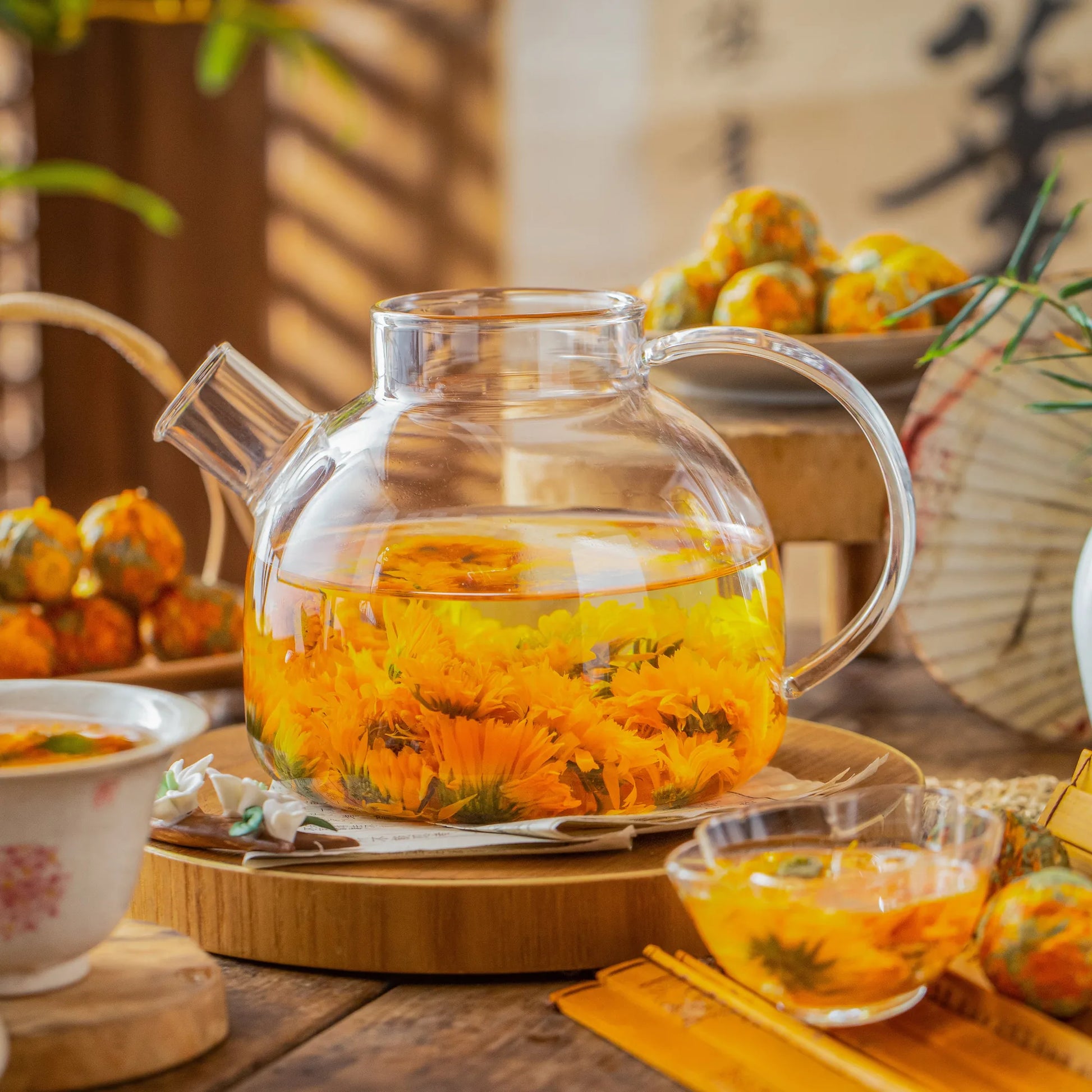 Orange flowering tea serving scene