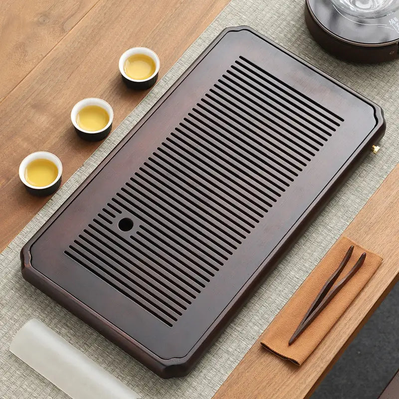 Dark wooden tea tray with drainage slats from Flowkeeper bamboo gongfu tea tray collection