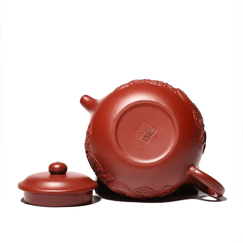Reddish-brown Yixing Zisha teapot with lid featuring hand-carved dragon design from Imperial Ascend Yixing
