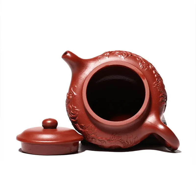 Reddish-brown Yixing Zisha teapot with lid featuring hand-carved dragon design from Imperial Ascend Yixing