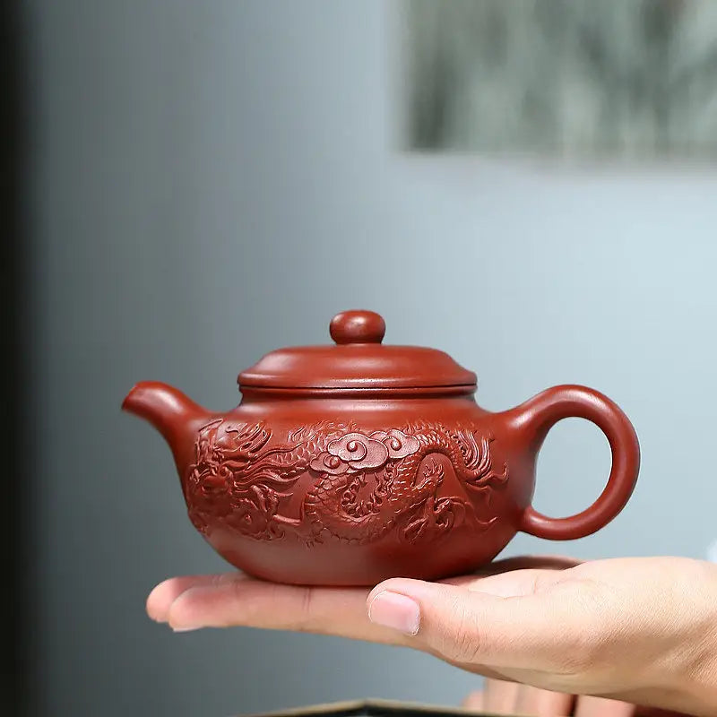 Red clay teapot with hand-carved dragon relief, Yixing Zisha imperial ascend Yixing