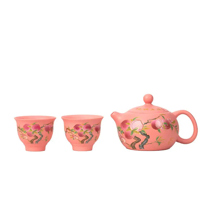 Peach-themed Forest Echo Tea Set crafted from Yixing Zisha Zisha Clay for elegant tea brewing