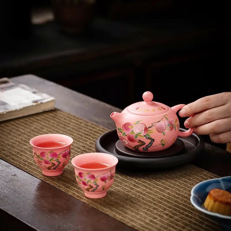 Pink peach-themed Forest Echo Tea Set in Yixing Zisha Zisha Clay style