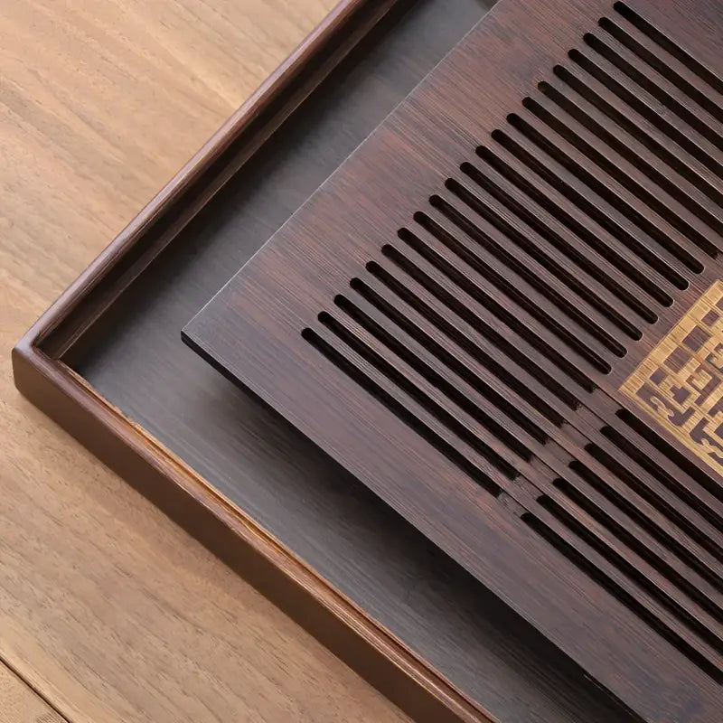Dark wooden gongfu tea tray with slotted insert from Fortune & Blessing bamboo tea tray collection