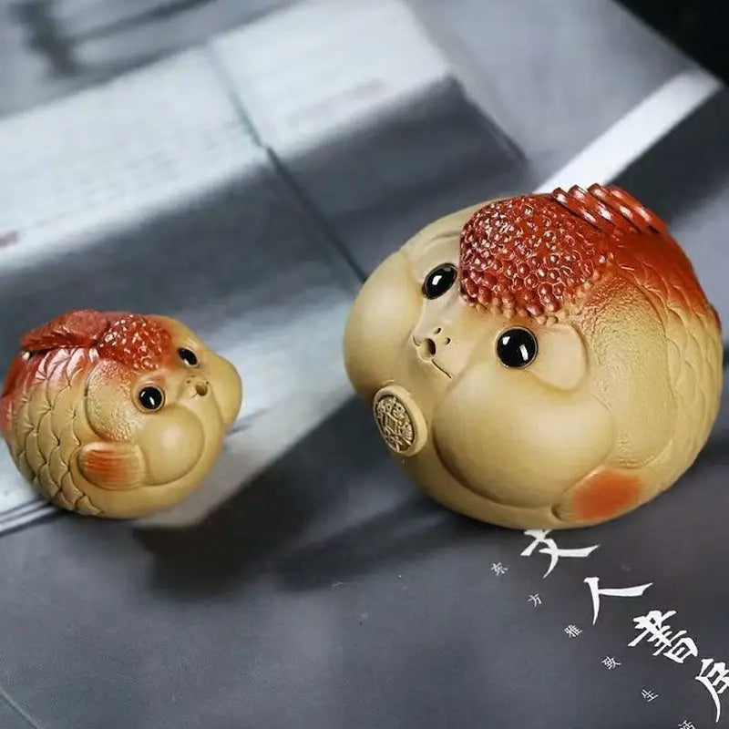 Ceramic goldfish figurines as fish tea pet for feng shui tea pets display in Fortune Bloat