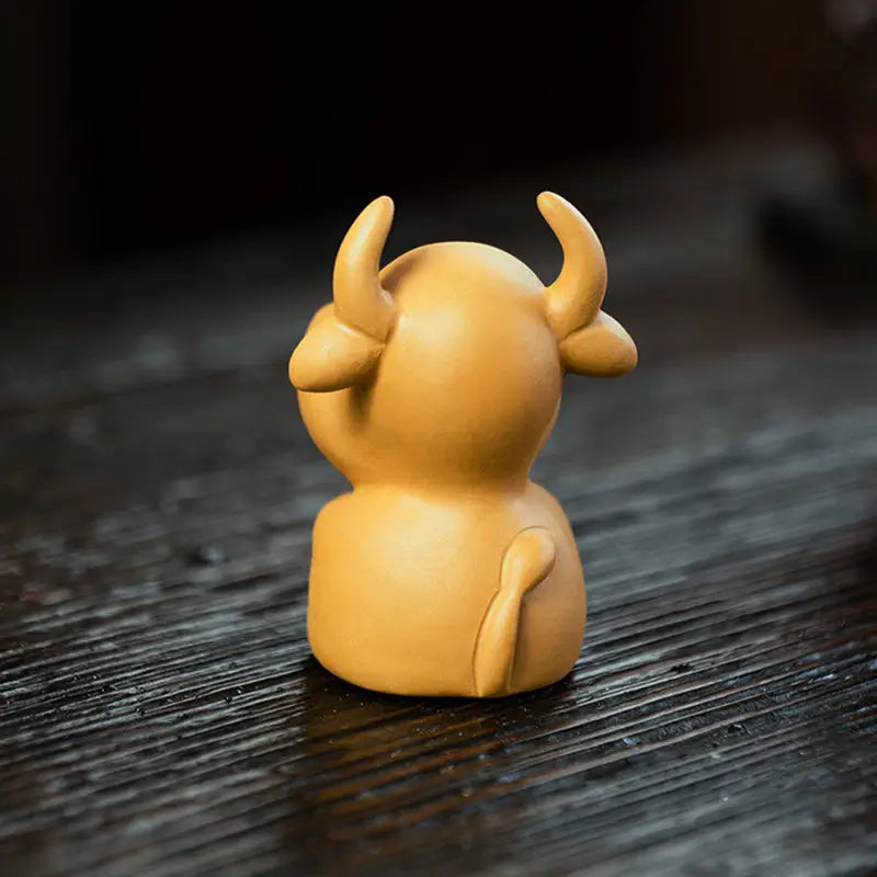 Ceramic Ox Figurine Fortune Grazer tea pet guide for feng shui tips and decoration