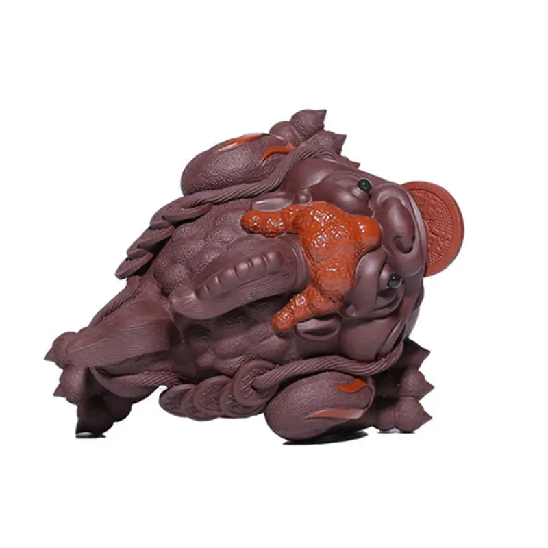 Brownish-purple toad-like Fortune Guardian Pixiu figurine with red accents as a Pixiu Tea Pet