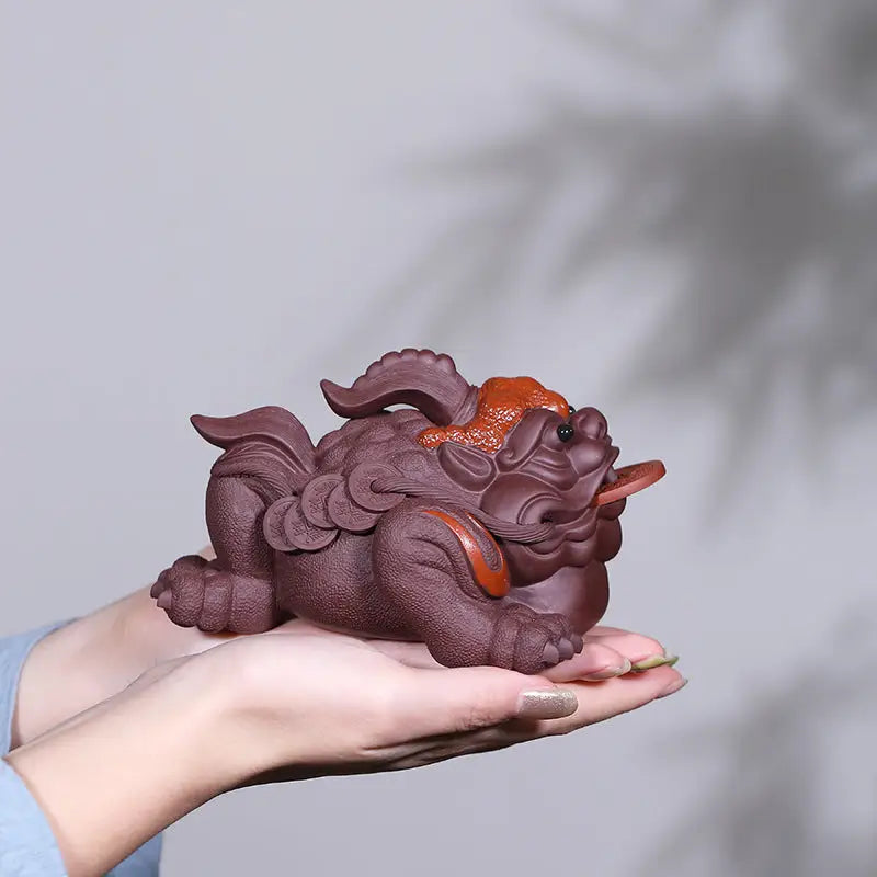 Purple clay mythical creature representing Fortune Guardian Pixiu, ideal as a guardian Pixiu tea pet