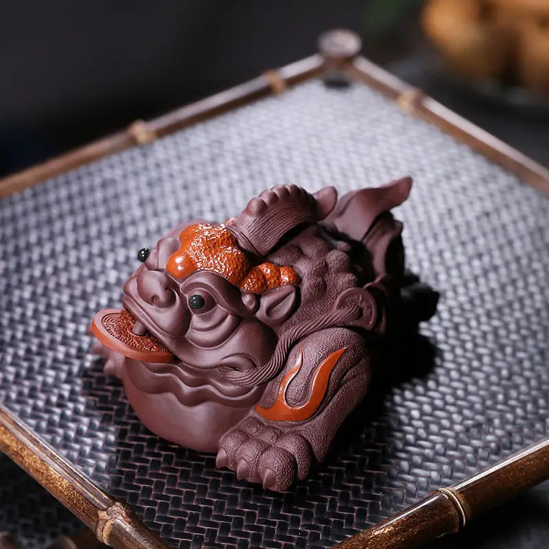 Purple clay money frog as part of the Fortune Guardian Pixiu guardian pixiu tea pet collection