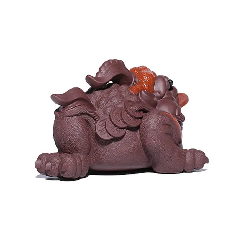 Brownish-purple Fortune Guardian Pixiu tea pet figurine with coins for good luck and wealth