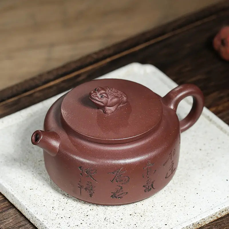 Maroon Fortune Toad Yixing teapot with frog-shaped lid showcasing Toad Yixing Zisha craftsmanship