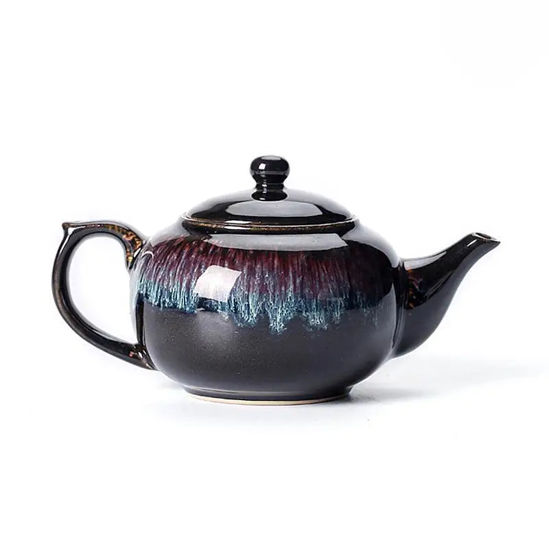 Dark glazed ceramic Galaxy Teapot with night sky-inspired tenmoku glaze and Jian Zhan style