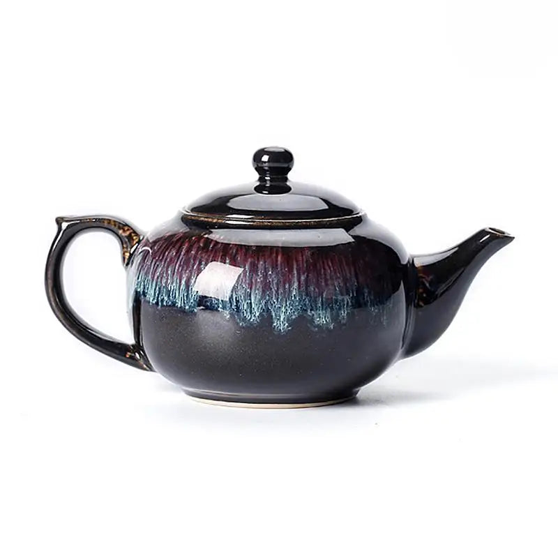 Dark glazed ceramic Galaxy Teapot with night sky-inspired tenmoku glaze and Jian Zhan style