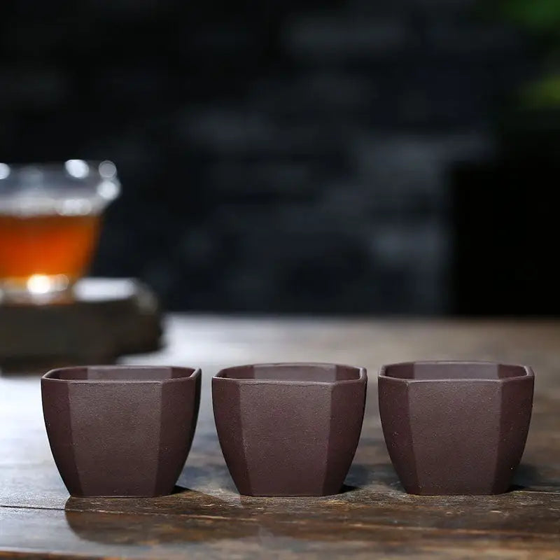Three brown faceted Yixing Zisha Square teacups for Gongfu Tea in Zisha Clay Teacup style