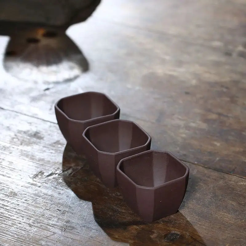 Three brown yixing zisha square bowls from Geometric Tranquility for gongfu tea brewing