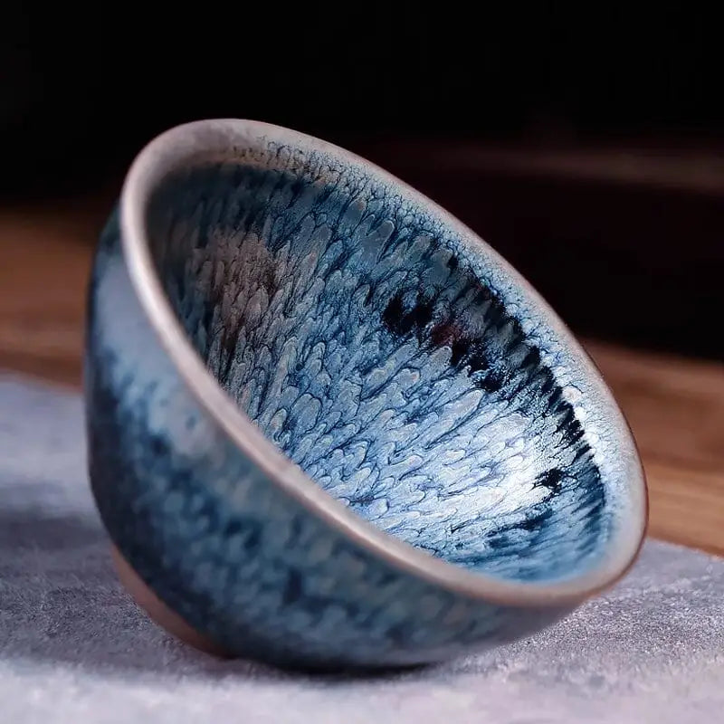 Blue-glazed ceramic teacup from Glacier Jian Zhan Tenmoku Tea Bowl collection