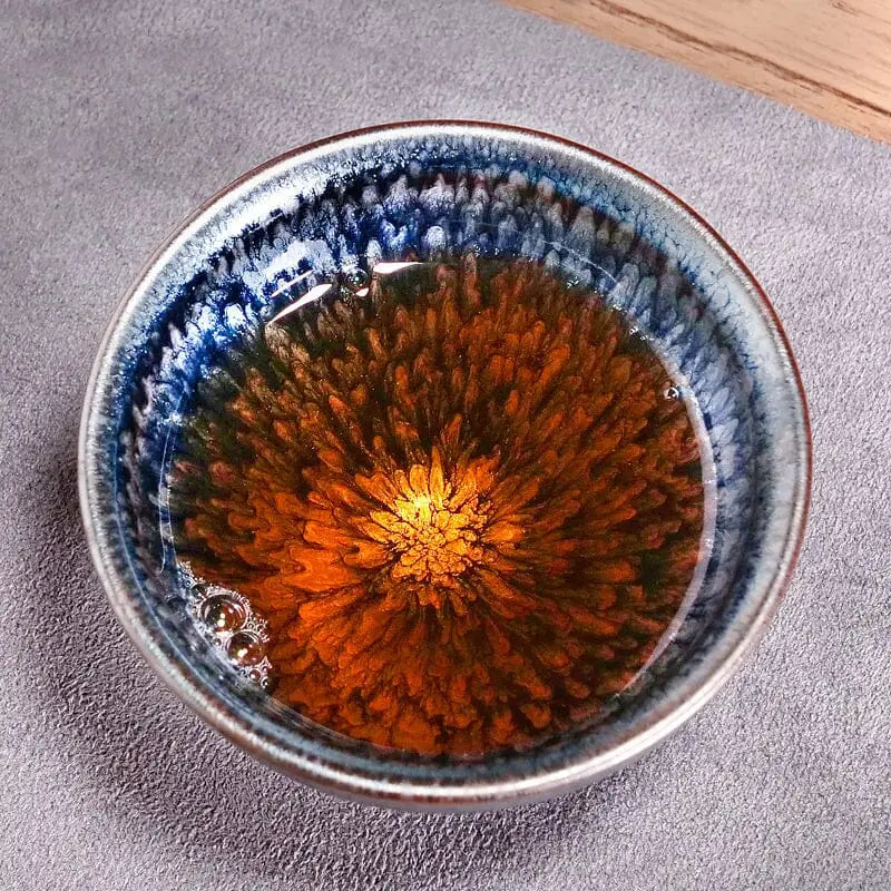 Glacier Jian Zhan tenmoku tea bowl with brown and blue glaze for traditional tea drinking
