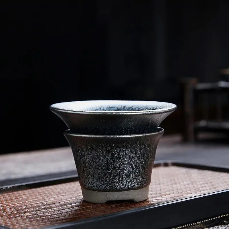 Dark textured ceramic tea steeper from Glacier Tea Set with crystalline and tenmoku glaze