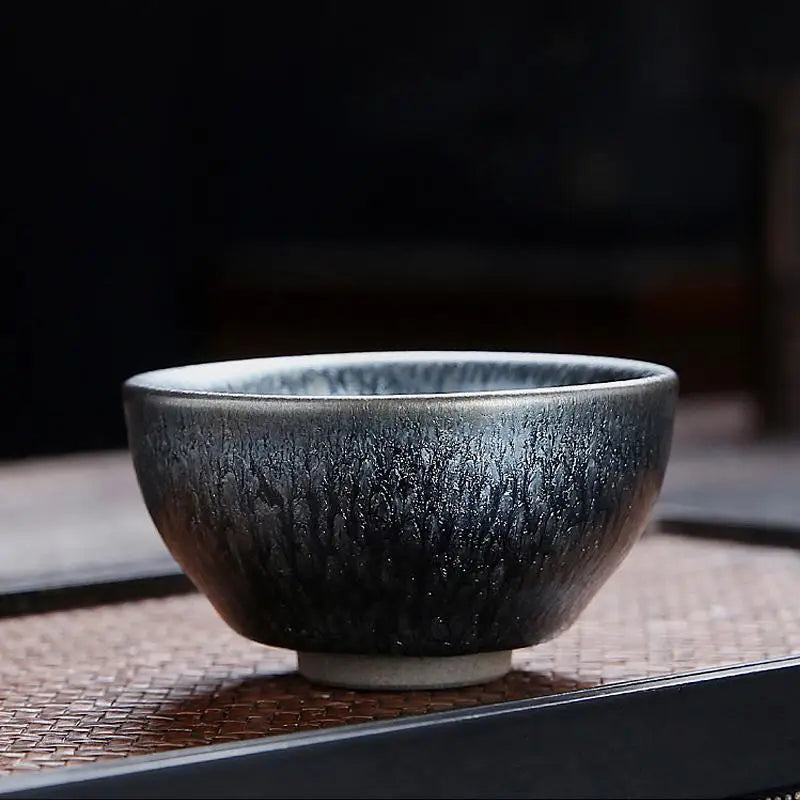 Dark textured ceramic bowl from Glacier Tea Set with crystalline and Tenmoku glaze