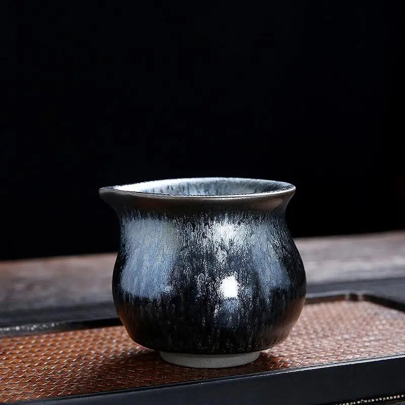 Black and silver glazed ceramic pitcher from Glacier Tea Set with crystalline and Tenmoku glaze