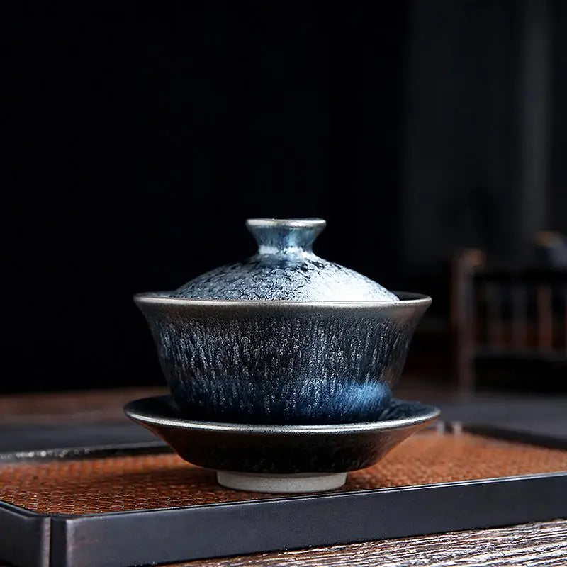 Blue and black ceramic Glacier Tea Set with crystalline and tenmoku glaze finish