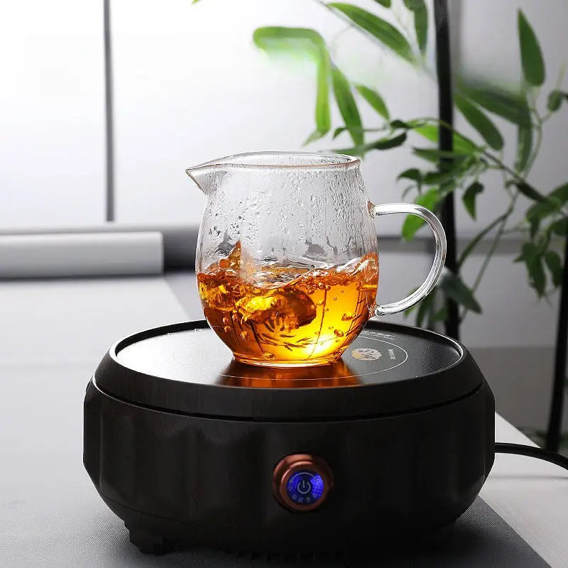 Heat-resistant borosilicate glass fair cup with glass teapot on warmer for Gong Dao Bei tea brewing