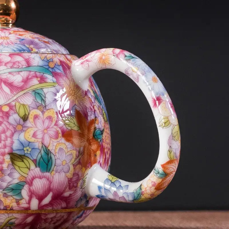 Floral-patterned ceramic teapot featuring gold floral enamel design in Jingdezhen enamel art