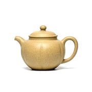 Golden Dew tan ceramic teapot in Yixing Zisha style, perfect for tea enthusiasts