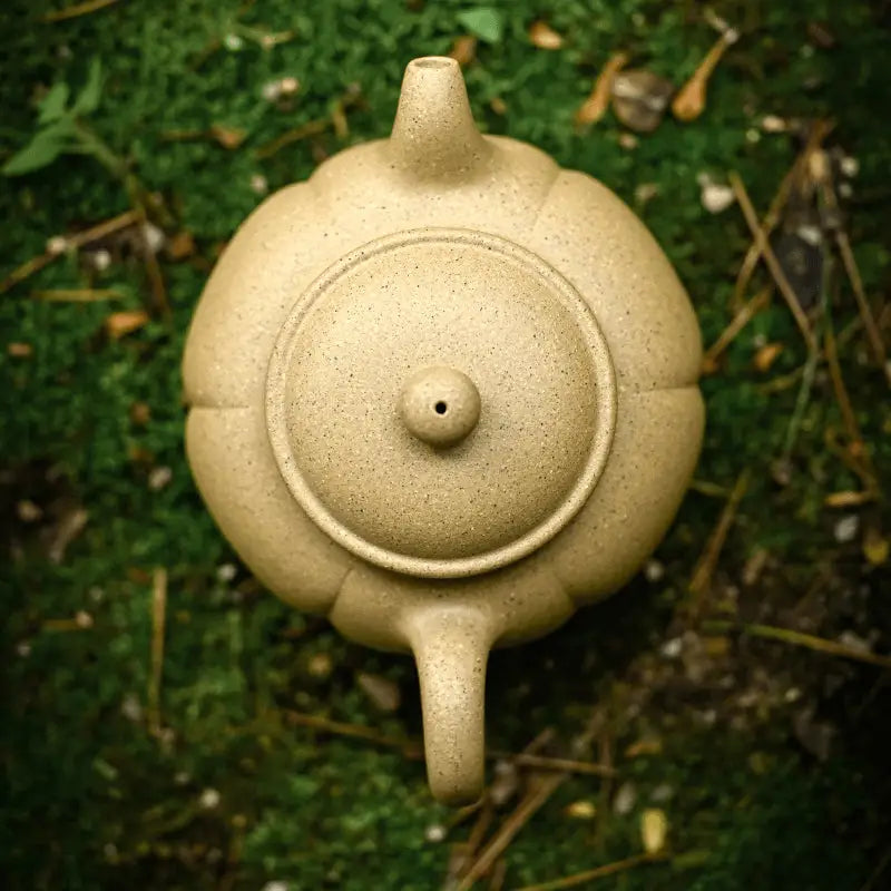Golden Dew tan pumpkin-shaped teapot crafted from Yixing Zisha clay for a unique tea experience