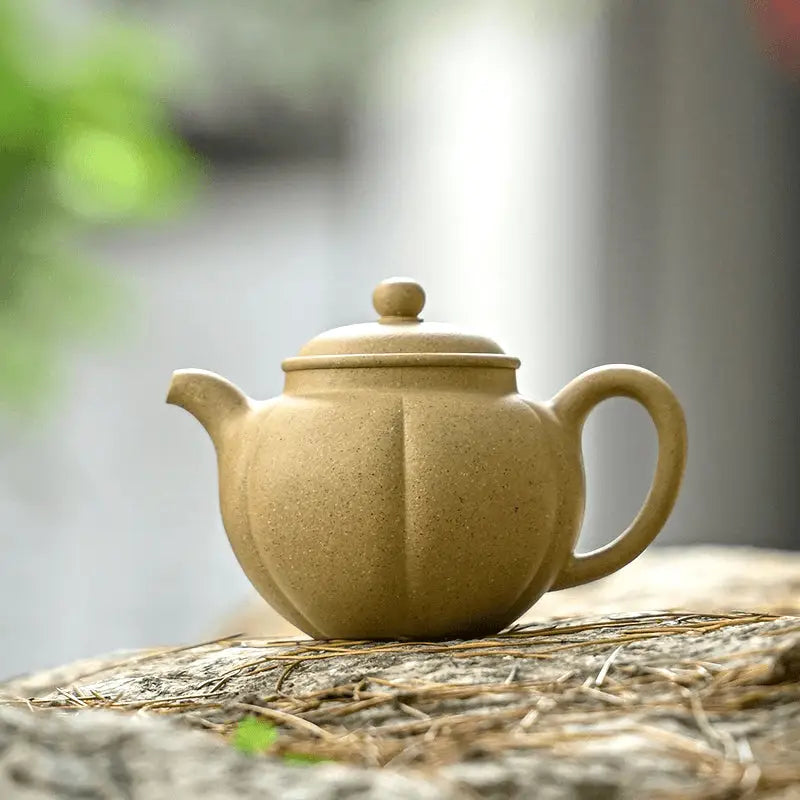 Earthenware teapot with lid from Golden Dew featuring Yixing Light Yixing Zisha clay