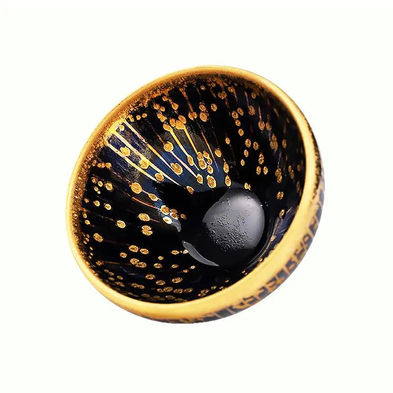 Dark blue and gold speckled bowl from Golden Drops for Jian Zhan tea by tea connoisseurs