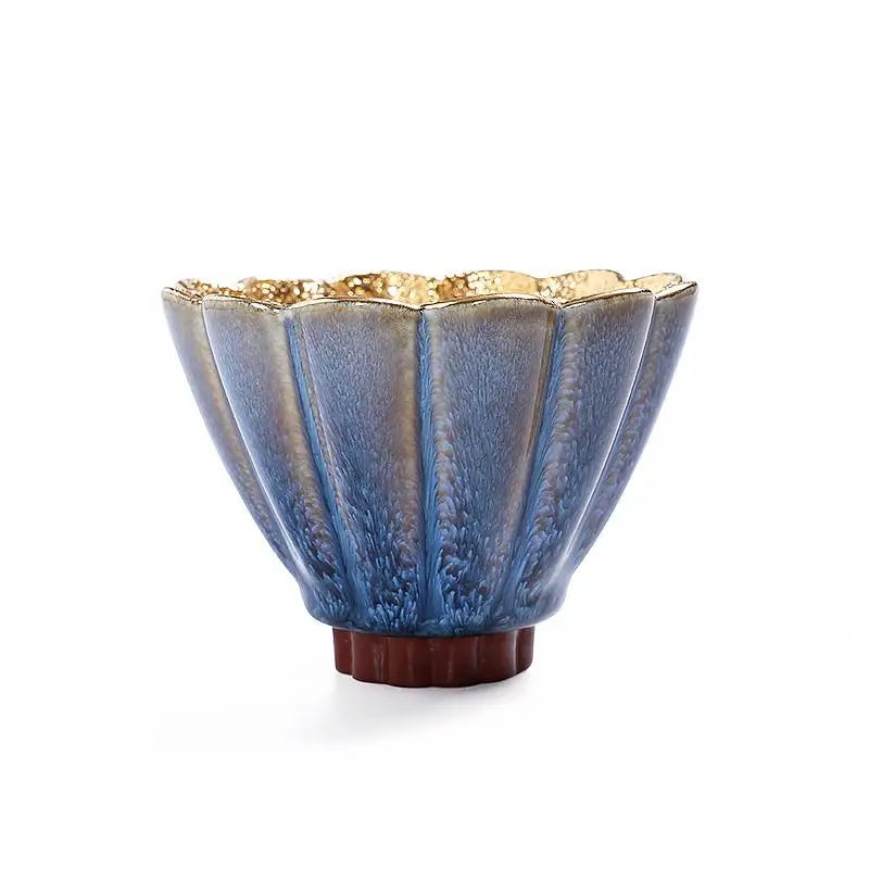 Blue and gold fluted ceramic bowl from Golden Flower teacup collection