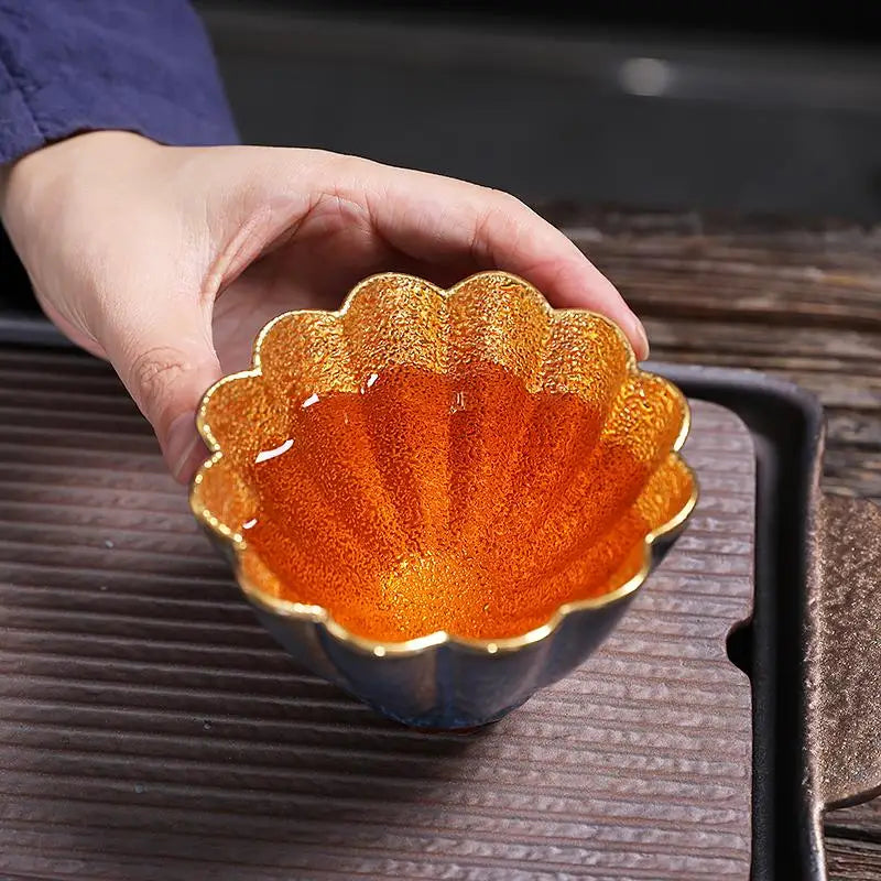 Ornate golden-lined flower teacup from Golden Flower collection for elegant tea serving