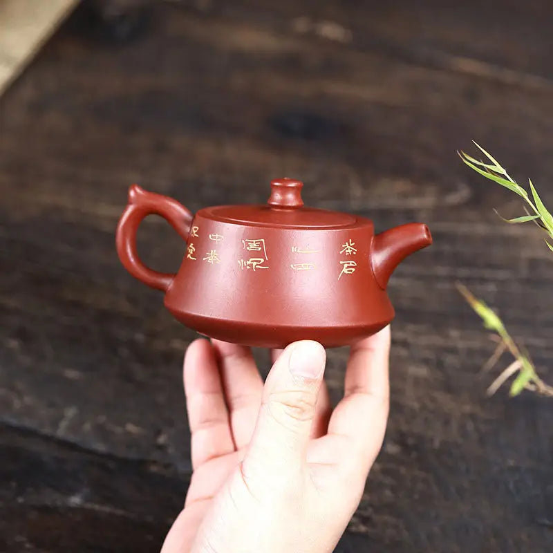 Reddish-brown handmade Yixing Zisha teapot with Chinese characters for Golden Ginkgo harmony