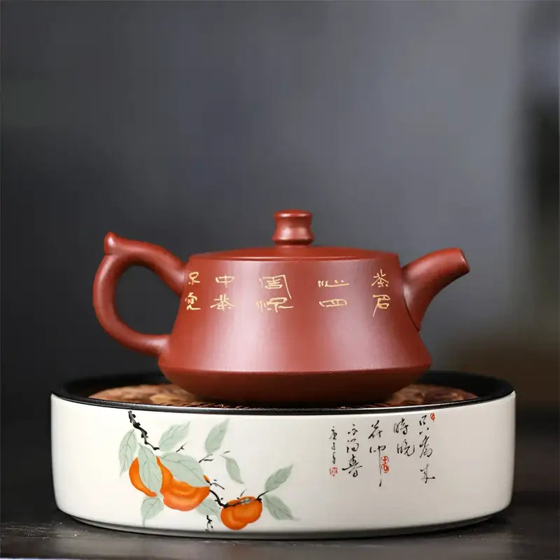 Reddish-brown ceramic teapot from Golden Ginkgo Harmony, handmade Yixing Zisha teapot
